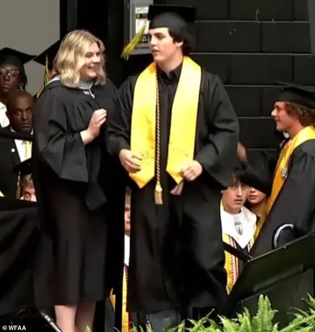 Hunter Metcalf receives diploma alongside posthumous award for brother Austin.